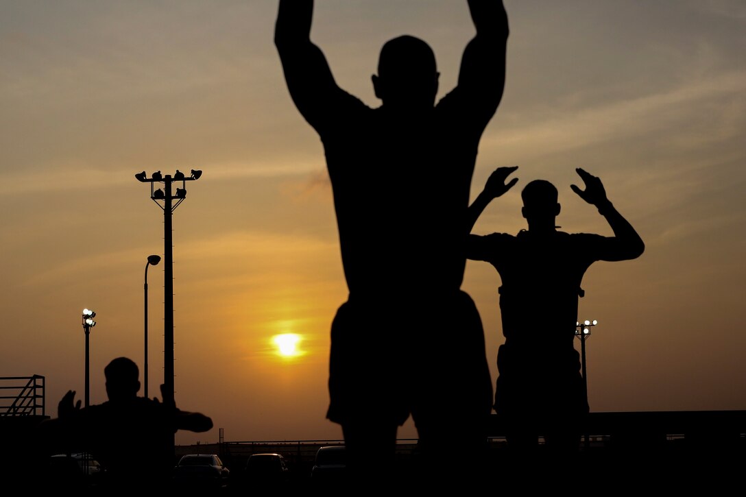 III Marine Expeditionary Force Marines perform burpees during a Force Fitness Instructor (FFI) course July 31, 2018 at Camp Hansen, Okinawa, Japan. Marines participating are required to lead physical training exercises to demonstrate the various exercise techniques they’ve learned during the six-week course. (U.S. Marine Corps photo by Pfc. Kindo Go)