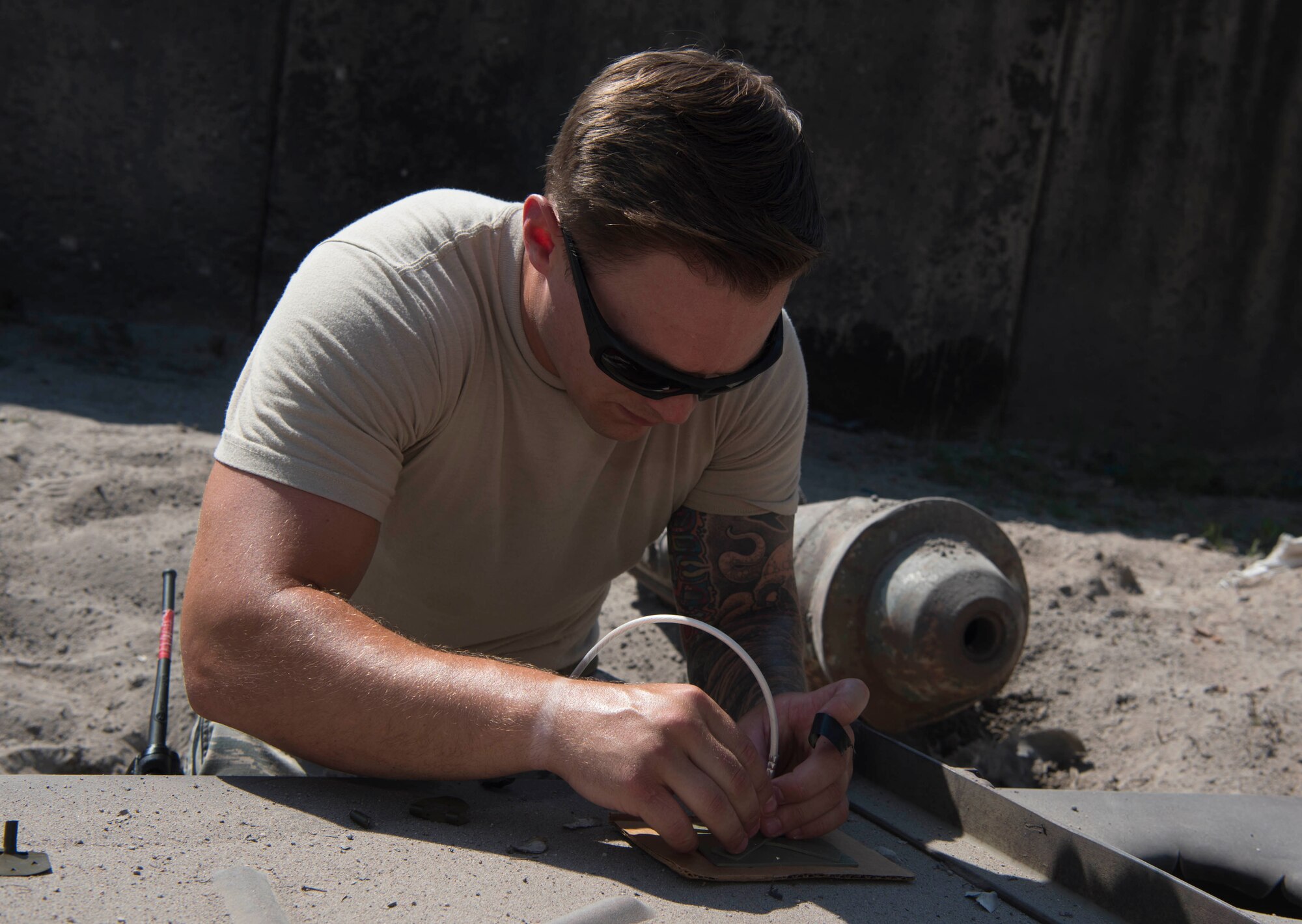 The 786th Civil Engineer Squadron Explosive Ordinance Disposal Airmen observe the effects of explosive detonation charges on Ramstein Air Base, Germany, July 31, 2018. EOD members apply classified techniques and special procedures to lessen or remove the hazards created by the presence of unexploded ordnance. (U.S. Air Force photo by Senior Airman Elizabeth Baker)