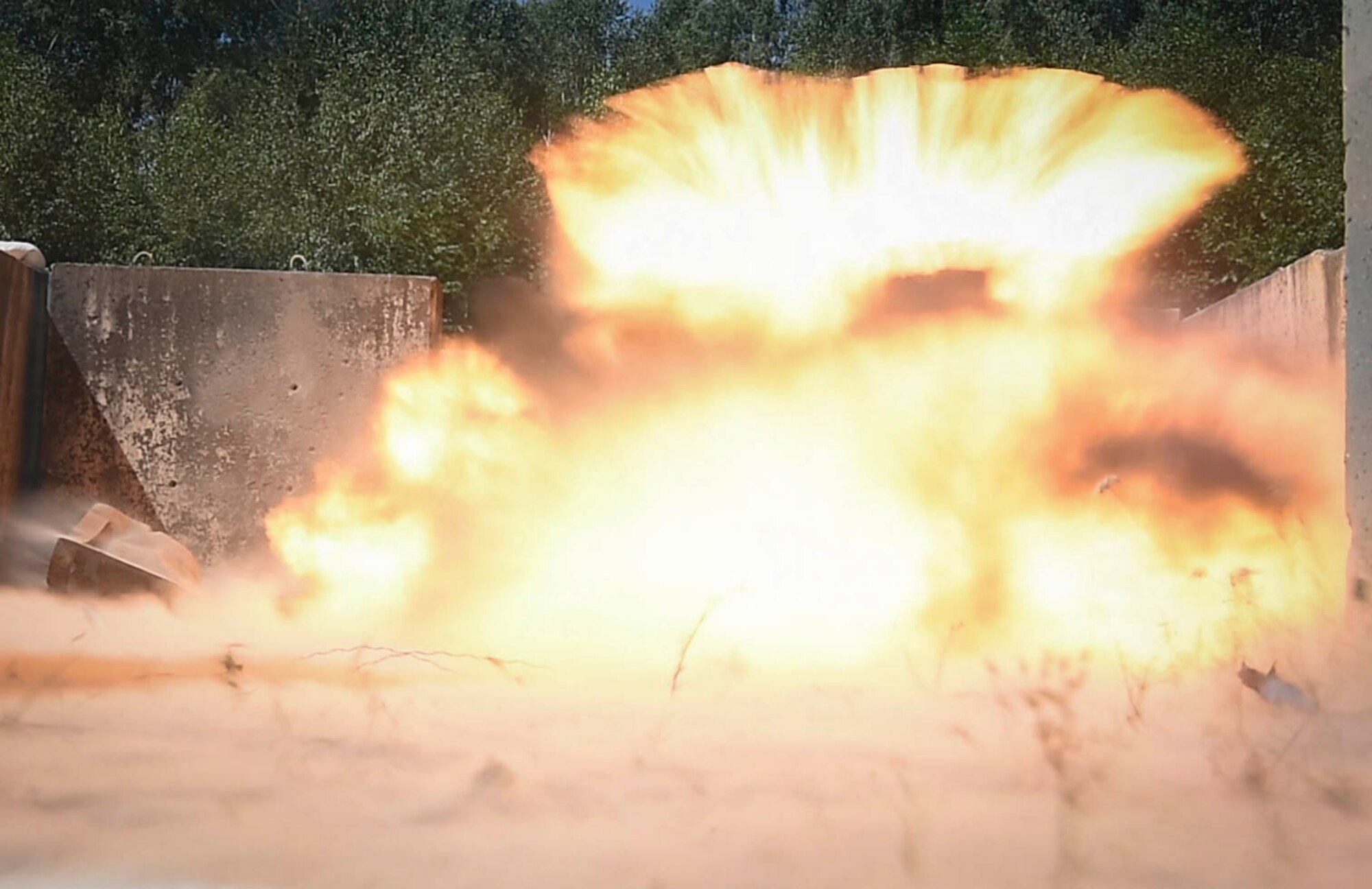 An explosive charge detonates during an 786th Civil Engineer Squadron Explosive Ordinance Disposal training on Ramstein Air Base, Germany, July 31, 2018. The EOD motto of “initial success or total failure” reflects EOD’s mission to enter dangerous situations and safely neutralize threats. (U.S. Air Force photo by Senior Airman Elizabeth Baker)