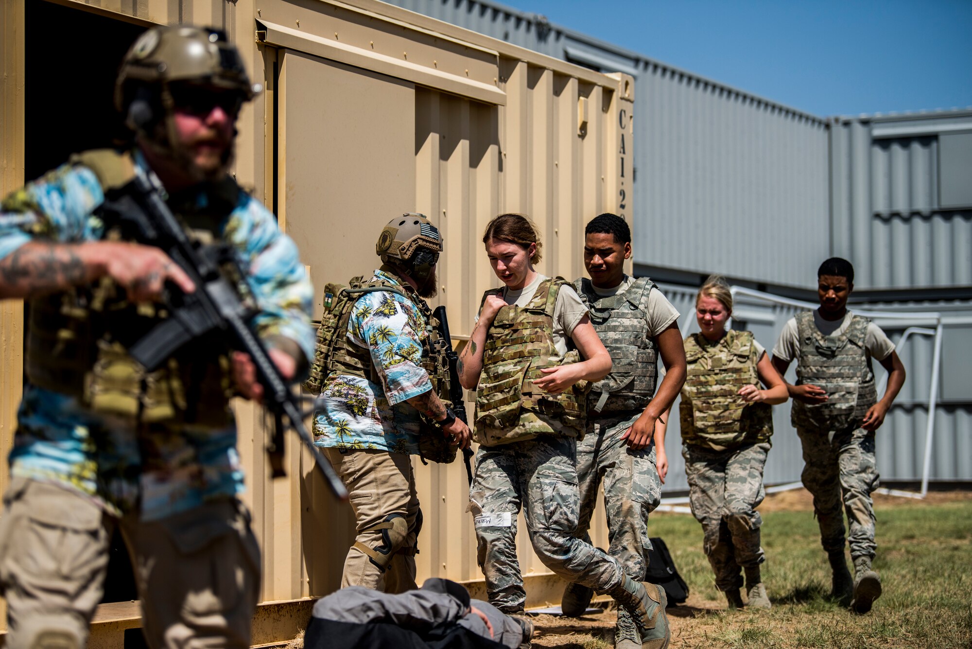 Medics escorted to cover