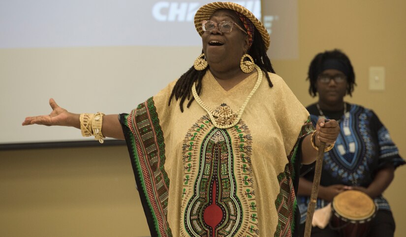 A guest speaker delivers a presentation during Diversity Day Aug. 10, 2018, at the base Chapel Annex.