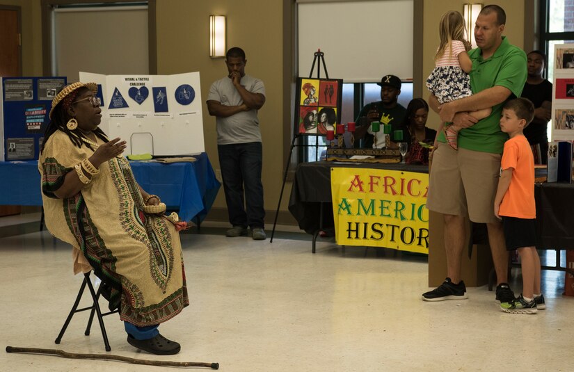 A guest speaker delivers a presentation during Diversity Day Aug. 10, 2018, at the base Chapel Annex.