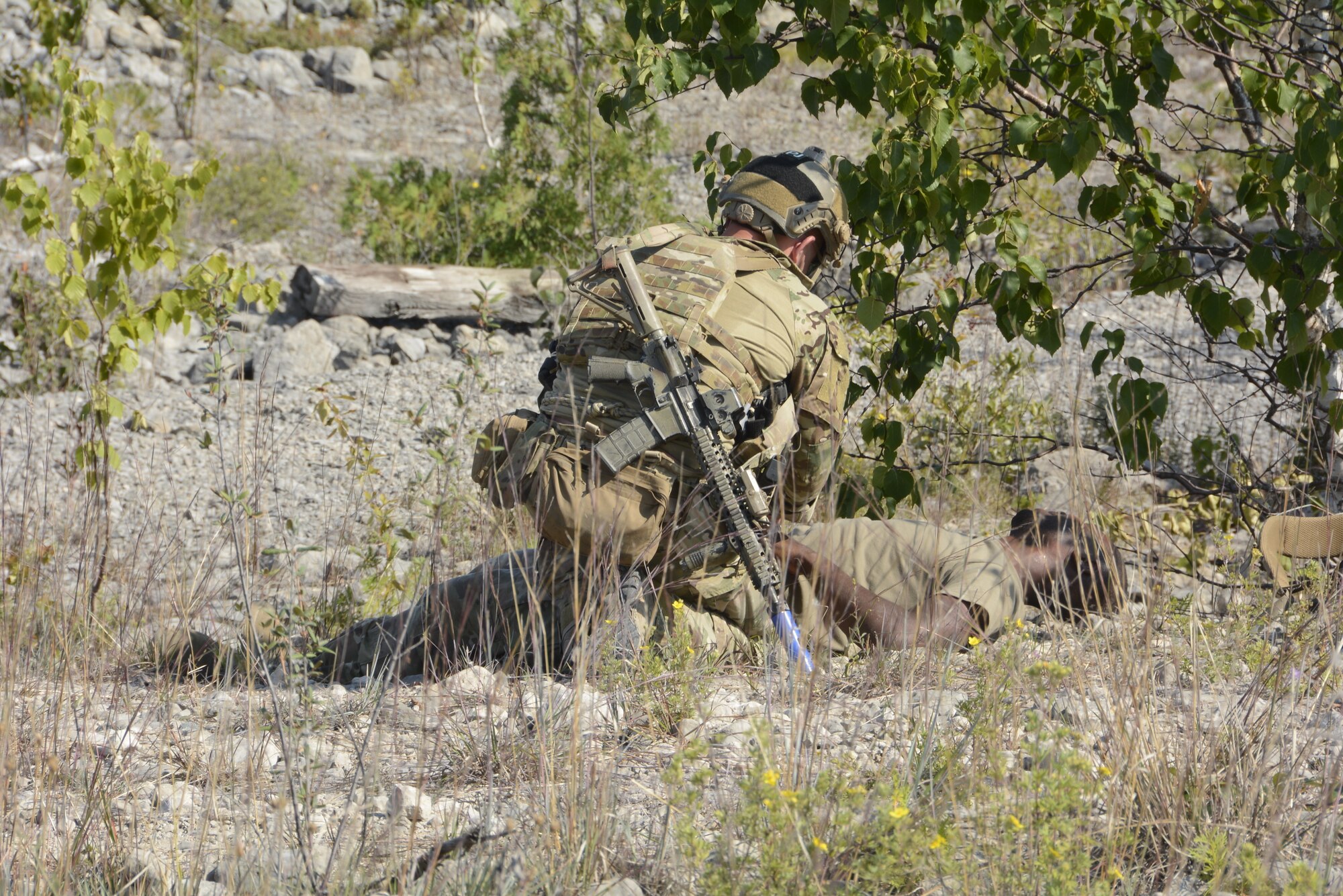Pararescue specialists from the 103rd Pararescue Squadron, Westhampton Beach, New York, execute a rescue training mission for Northern Strike 18, Aug. 10, 2018. Northern Strike 18 is a National Guard Bureau-sponsored exercise uniting service members from many states, multiple service branches and a number of coalition countries during the first three weeks of August 2018 at the Camp Grayling Joint Maneuver Training Center and the Alpena Combat Readiness Training Center, both located in northern Michigan and operated by the Michigan National Guard. The accredited Joint National Training Capabilities exercise demonstrates the Michigan National Guard's ability to provide accessible, readiness-building opportunities for military units from all service branches to achieve and sustain proficiency in conducting mission command, air, sea, and ground maneuver integration, together with the synchronization of fires in a joint, multinational, decisive action environment. (U.S. Air National Guard photo by Airman 1st Class Tiffany Clark)