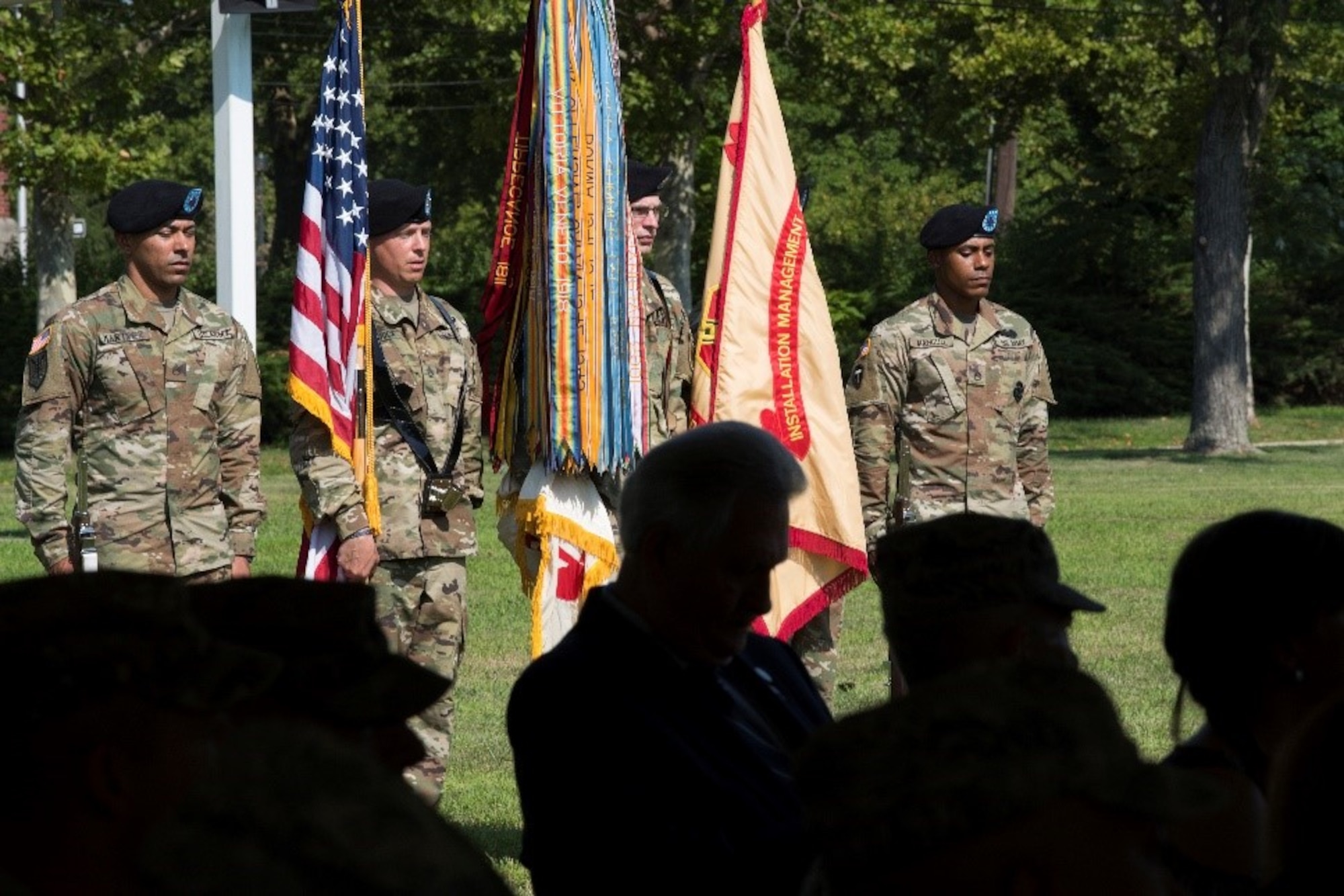 Soldiers from the U.S. Army Joint Base McGuire-Dix-Lakehurst NCO Academy color guard present the colors during the Army Support Activity-Fort Dix change of command ceremony at Sharp Field on Joint Base MDL, N.J., Aug. 8, 2018. During change of command ceremonies, the passing of the colors symbolizes the transfer of authority and allegiance of the Soldiers from the outgoing to incoming commander.