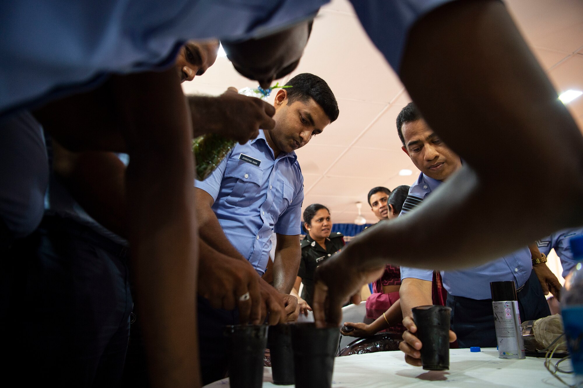 Sri Lankan civilian public health officials, entomologists, military doctors, and military public health officials build mosquito and tick traps during an exchange for Pacific Angel 18-4, in Anuradhapura, Sri Lanka, Aug. 9, 2018. Through PAC ANGEL 18, the U.S. military strengthens its relationships with other nations’ through mutually beneficial activities to include humanitarian assistance and civil military operations, which promote regional cooperation and interoperability. (U.S. Air Force photo by Tech. Sgt. Heather Redman)