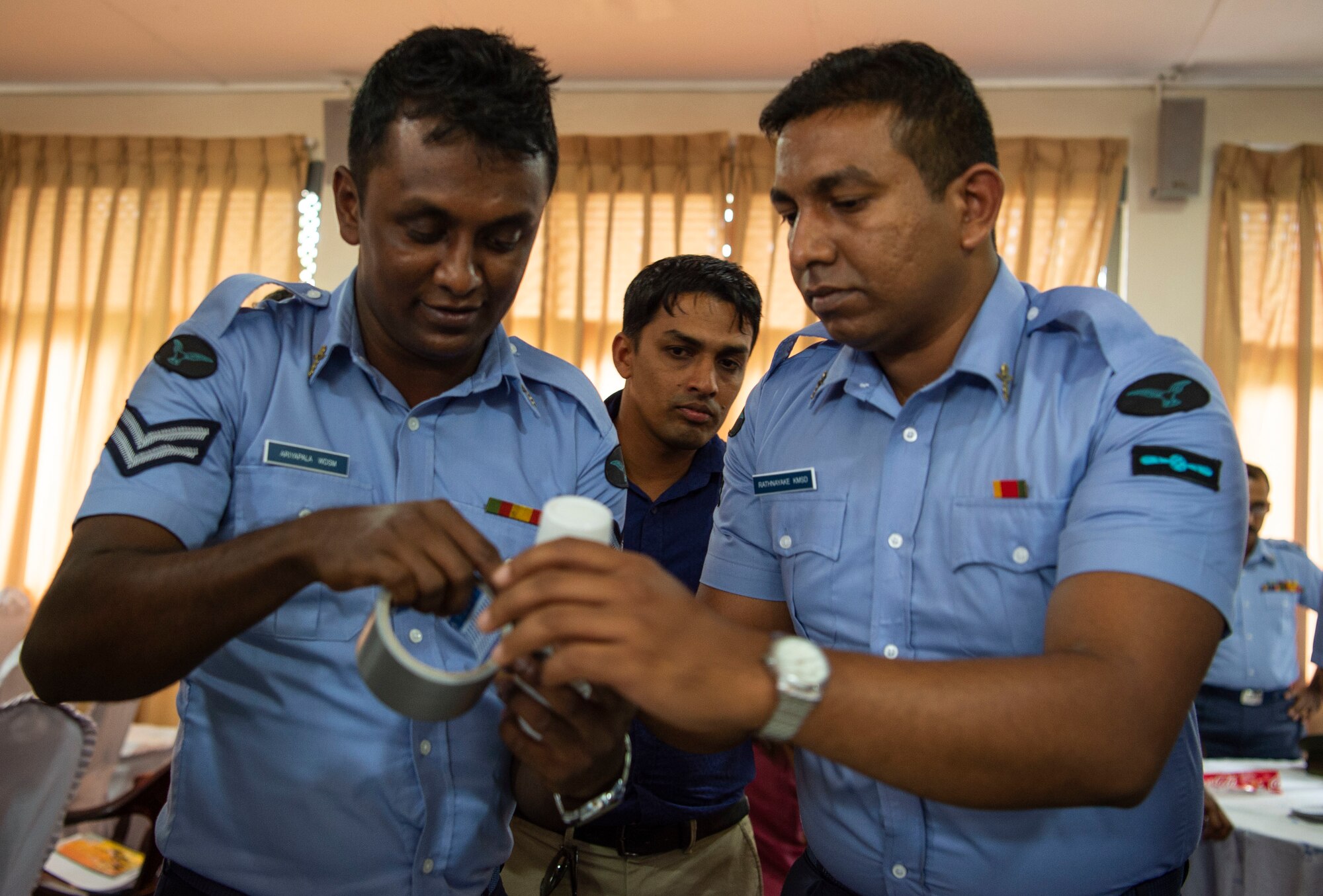 Sri Lankan civilian public health officials, entomologists, military doctors, and military public health officials build mosquito and tick traps during an exchange for Pacific Angel 18-4, in Anuradhapura, Sri Lanka, Aug. 9, 2018. PAC ANGEL 18 is a joint and combined humanitarian assistance engagement that enhances participating nations’ humanitarian assistance and disaster relief capabilities while providing beneficial services to people in need throughout South and Southeast Asia. (U.S. Air Force photo by Tech. Sgt. Heather Redman)