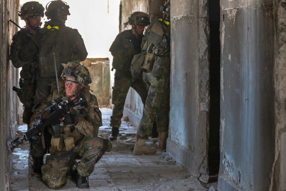 German soldiers clear an abandoned structure during an urban operations exercise as part of Noble Partner 18 at the Vaziani Training Area, Georgia.
