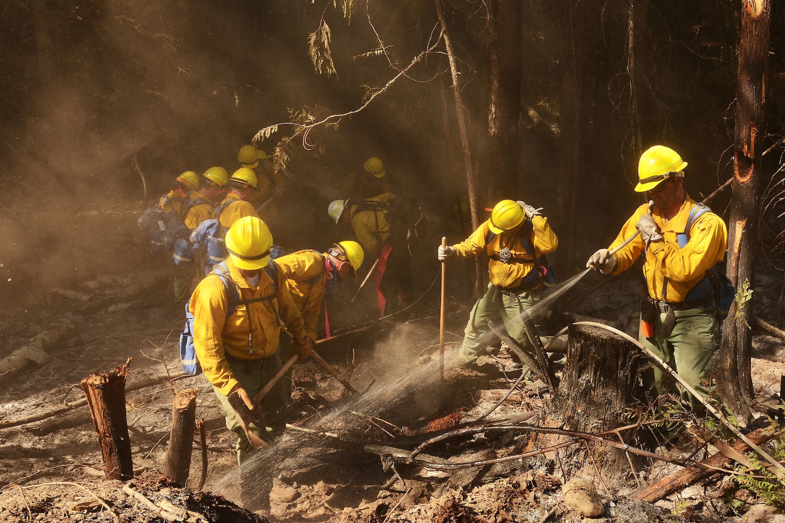 Air National Guard airmen fight a wildfire.