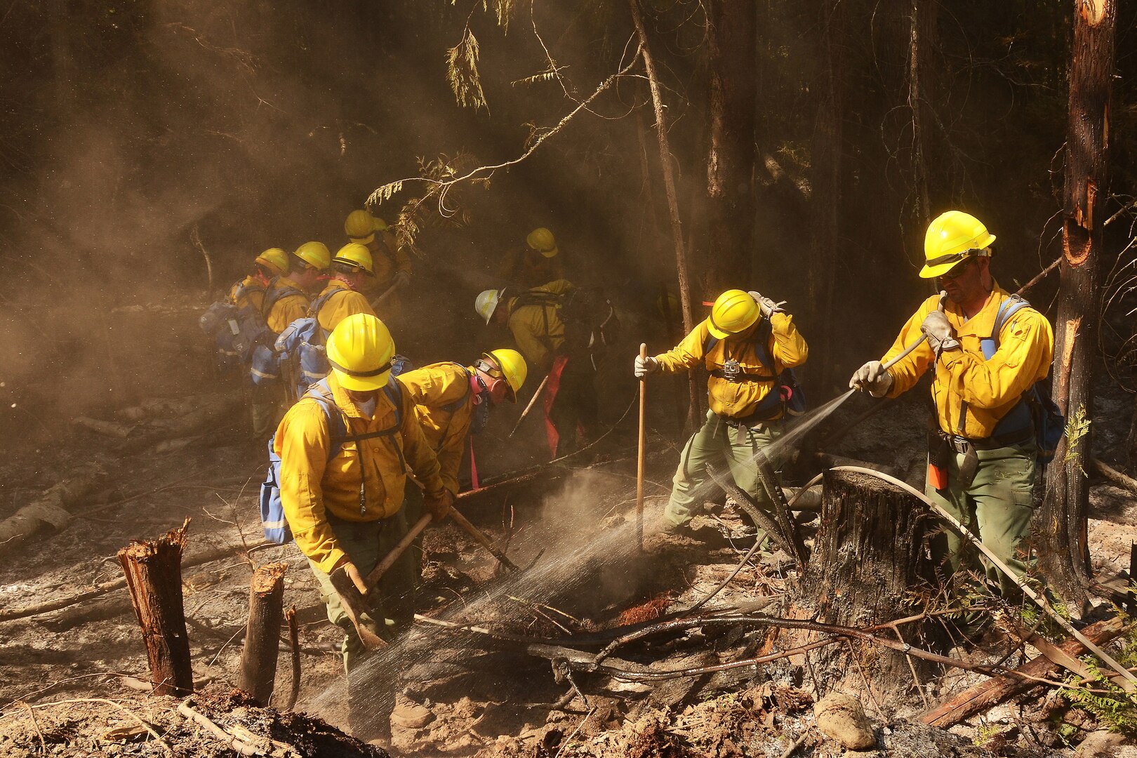 Airmen from the Washington Air National Guard fight the Sheep Creek fire Aug. 6, 2018, near Northport, Wash.  Washington Army and Air National Guardsmen made up 102 of the 350 personnel assigned to fight the Sheep Creek fire.
