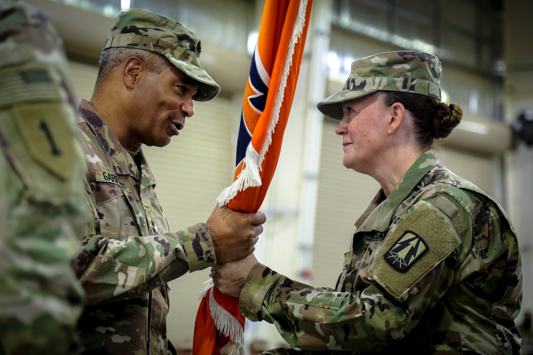 The official party observes the command during the 335th Signal Command (Theater) (Provisional) change of command ceremony between Brig. Gen. John H. Phillips and Brig. Gen. Nikki L. Griffin Olive. (U.S. Army photo by Staff Sgt. Timothy Villareal)