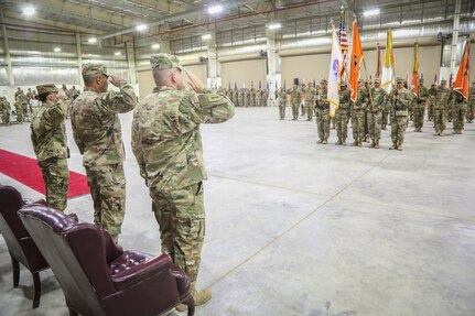 The official party observes the command during the 335th Signal Command (Theater) (Provisional) change of command ceremony between Brig. Gen. John H. Phillips and Brig. Gen. Nikki L. Griffin Olive. (U.S. Army photo by Staff Sgt. Timothy Villareal)