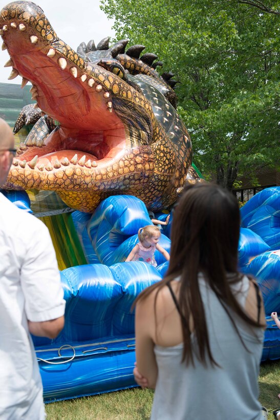 Families join their Reservists Aug. 5 for the 934th Airlift Wing's annual Family Day where inflatable attractions were popular with kids.  (Air Force Photo/Tech. Sgt. Amber E.N. Jacobs)