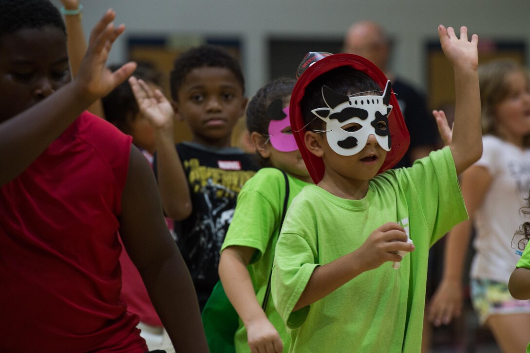 Children dance during the Army Community Service block party at Gen. Stanford Elementary School on Joint Base Langley-Eustis, Virginia, Aug. 9, 2018.