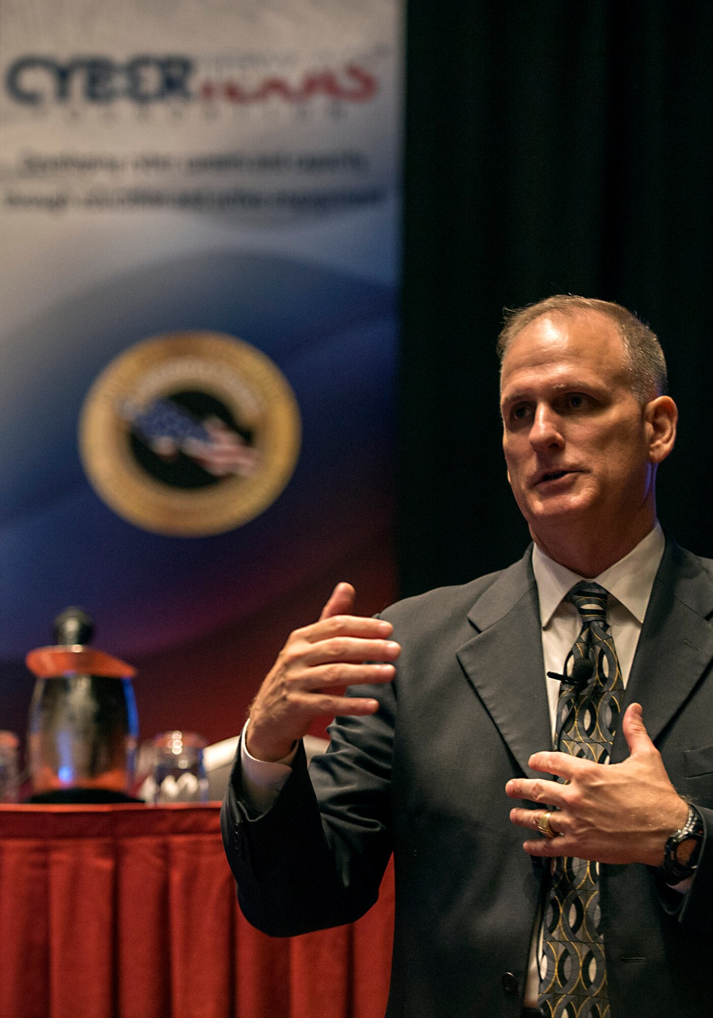 Robert Cole, Air Forces Cyber executive director, speaks to attendees at the CyberTexas Conference in San Antonio, Texas, Aug. 14, 2018. The conference was hosted to develop the next generations of cyber professionals. (U.S. Air Force photo by Tech. Sgt. R.J. Biermann)