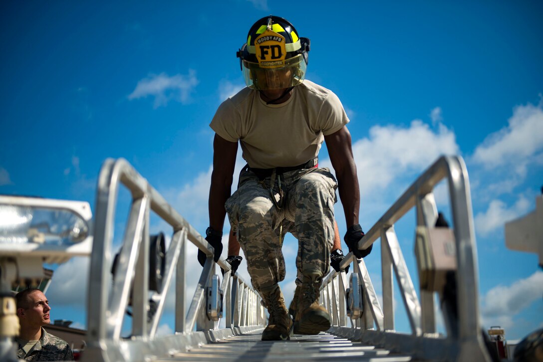 Airman 1st Class Jared King, 23d Civil Engineer Squadron (CES) water and fuel system maintenance apprentice, interns as a firefighter during the “A Day In A Life” program, Aug. 10, 2018, at Moody Air Force Base, Ga. The program challenges participating civil engineers to go behind-the-scenes to perform multiple jobs to better understand their fellow Airmen and better develop operational leaders. The firefighters from the 23d CES train daily through their multifaceted capabilities in fire prevention to ensure they are proficient in their duties to keep Moody safe. (U.S. Air Force photo by Airman 1st Class Erick Requadt)