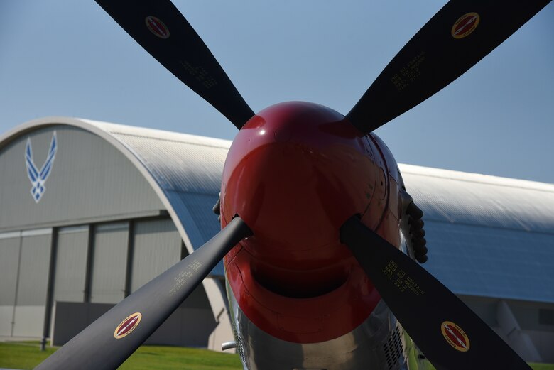 A view of the North American P-51D Mustang before restoration crews at the National Museum of the U.S. Air Force moved the aircraft into the WWII Gallery on Aug. 14, 2018. Several WWII era aircraft on display were temporarily placed throughout the museum to provide adequate space for the Memphis Belle exhibit opening events. (U.S. Air Force photo by Ken LaRock)