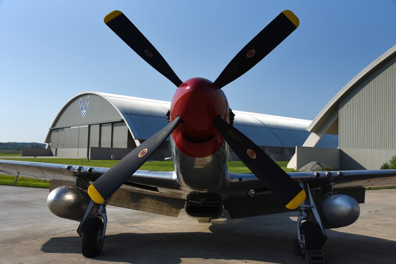 A view of the North American P-51D Mustang before restoration crews at the National Museum of the U.S. Air Force moved the aircraft into the WWII Gallery on Aug. 14, 2018. Several WWII era aircraft on display were temporarily placed throughout the museum to provide adequate space for the Memphis Belle exhibit opening events. (U.S. Air Force photo by Ken LaRock)
