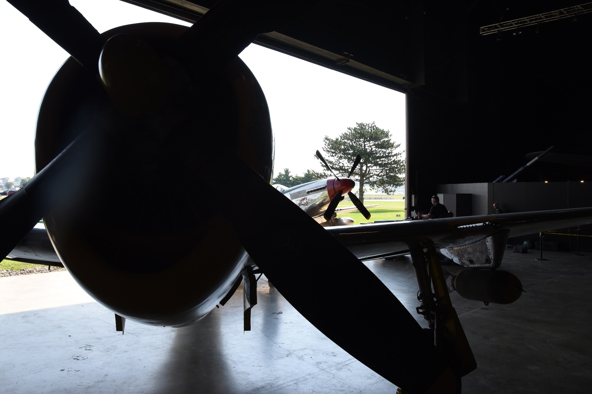 Museum restoration crews move the Republic P-47D (Bubble Canopy Version) back into the WWII Gallery at the National Museum of the U.S. Air Force on Aug. 14, 2018. Several WWII era aircraft were temporarily placed throughout the museum to provide adequate space for the Memphis Belle exhibit opening events. (U.S. Air Force photo by Ken LaRock)