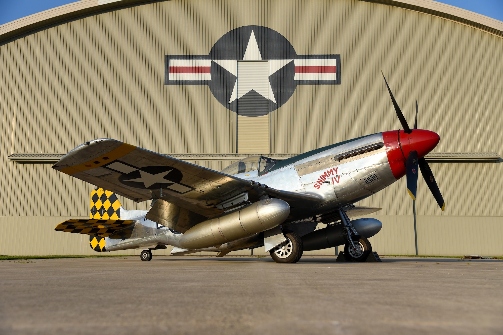 A view of the North American P-51D Mustang before restoration crews at the National Museum of the U.S. Air Force moved the aircraft into the WWII Gallery on Aug. 14, 2018. Several WWII era aircraft on display were temporarily placed throughout the museum to provide adequate space for the Memphis Belle exhibit opening events. (U.S. Air Force photo by Ken LaRock)