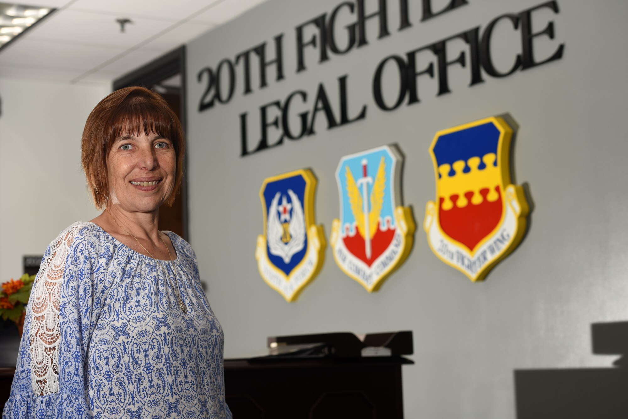 Christine Herrera, 20th Fighter Wing Staff Judge Advocate legal assistant, stands in the legal office at Shaw Air Force Base, S.C., Aug. 14, 2018.