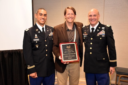 Present and Past USAREC Command Psychologists, Lt. Col. Joseph H. Afanador (left) and Lt. Col. Craig M. Jenkins (right) receive the 2018 Julius E. Uhlaner Award from Society for Military Psychology Division 19 President retired USAF Lt. Col. Mark Staal during the #APA2018 Convention in San Francisco, Califorinia. The Office of Command Psychologist was recognized with the Julius E. Uhlaner Award for their efforts to improve the effectiveness of the assessment for Soldiers being considered for or assigned to recruiting duty.