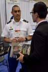 Lt. Col. Joseph H. Afanador, United States Army Recruiting Command, command psychologist speaks with an attendee of the American Psychological Association 2018 Convention at the Moscone Center in San Francisco, California on August 9. Afanador was on hand with members of the San Francisco Medical Recruiting Station to explain the benefits and opportunities of a career in Army Medicine. For more information on the Army's more than 90 medical specialties go to healthcare.goarmy.com.