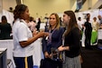 Maj. Lakishia M. Simmons, San Francisco Medical Recruiting Station officer-in-charge, speaks with a convention attendee and her parent at the American Psychological Association 2018 Convention held at the Moscone Center in San Francisco, California on August 9. Simmons was on hand with her healthcare recruiting team to explain the benefits and opportunities of a career in Army Medicine. For more information on the Army's more than 90 medical specialties go to healthcare.goarmy.com.