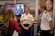 Staff Sgt. Shanna M. Rodriguez, health care recruiter with the San Francisco Medical Recruiting Station, and Capt. Emily Burris, clinical psychology resident with Brooke Army Medical Center, speak with an attendee of the American Psychological Association 2018 Convention at the Moscone Center in San Francisco, California on August 9. Rodriguez and Burris were on hand with explain the benefits and opportunities of a career in Army Medicine. For more information on the Army's more than 90 medical specialties go to healthcare.goarmy.com.