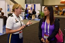 Staff Sgt. Shanna M. Rodriguez, health care recruiter with the San Francisco Medical Recruiting Station, speaks with an attendee of the American Psychological Association 2018 Convention at the Moscone Center in San Francisco, California on August 9. Rodriguez was on hand with Soldiers from her station to explain the benefits and opportunities of a career in Army Medicine. For more information on the Army's more than 90 medical specialties go to healthcare.goarmy.com.