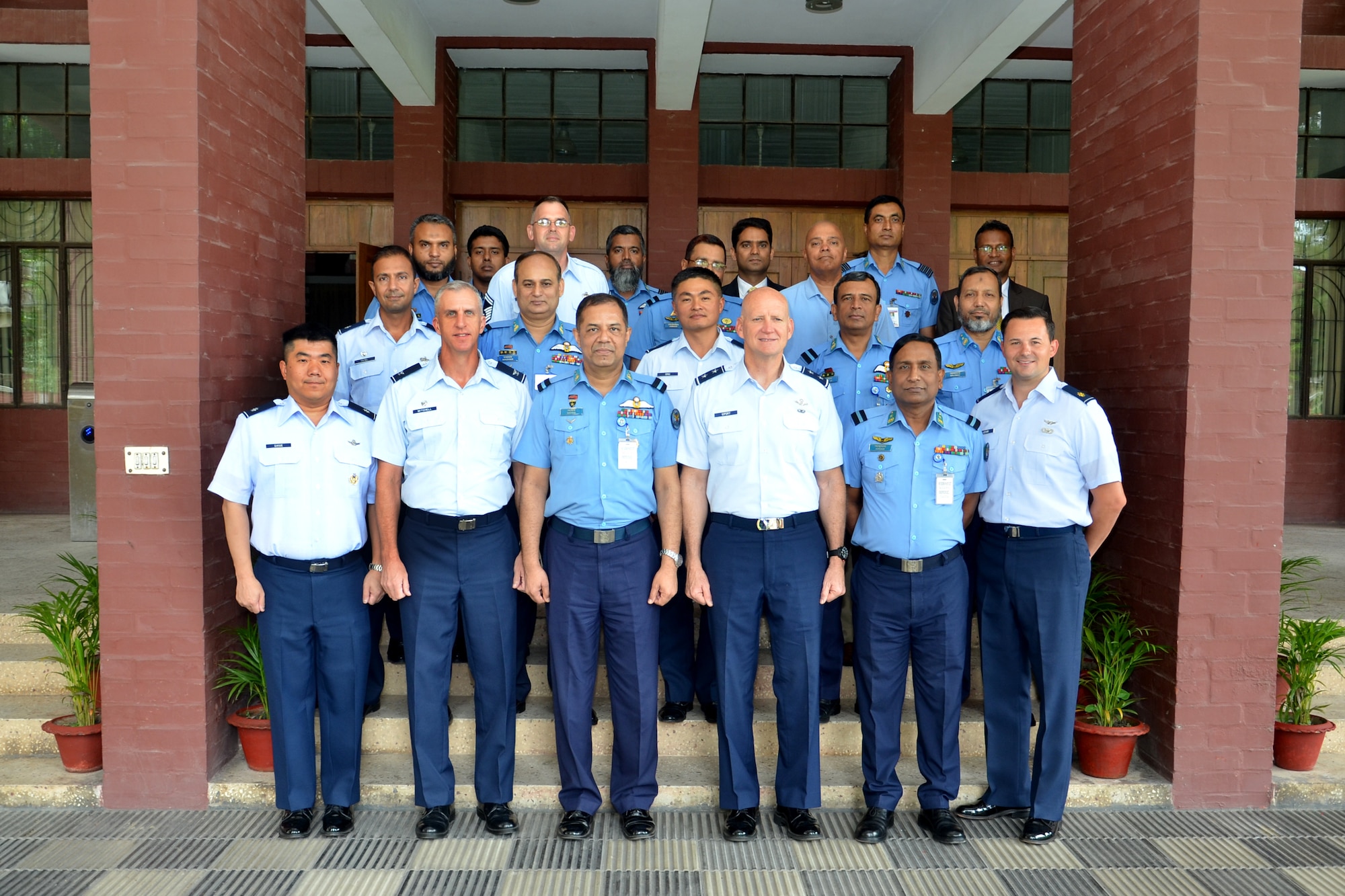 (Center, right) U.S. Air Force Maj. Gen. James Eifert, Air National Guard Assistant to the Commander, Pacific Air Forces, (center, left) Air Commodore M Sayed Hossain, director of air training for the Bangladesh air force, and representatives pose for a group photo during Airman-to-Airman (A2A) talks held at Air Headquarters of the Bangladesh air force, Dhaka, Bangladesh, August 1-2, 2018. A2A talks are designed to foster military-to-military relationships and pave the way for future collaboration. The exchange allows Airmen to meet face-to-face to discuss common regional challenges.