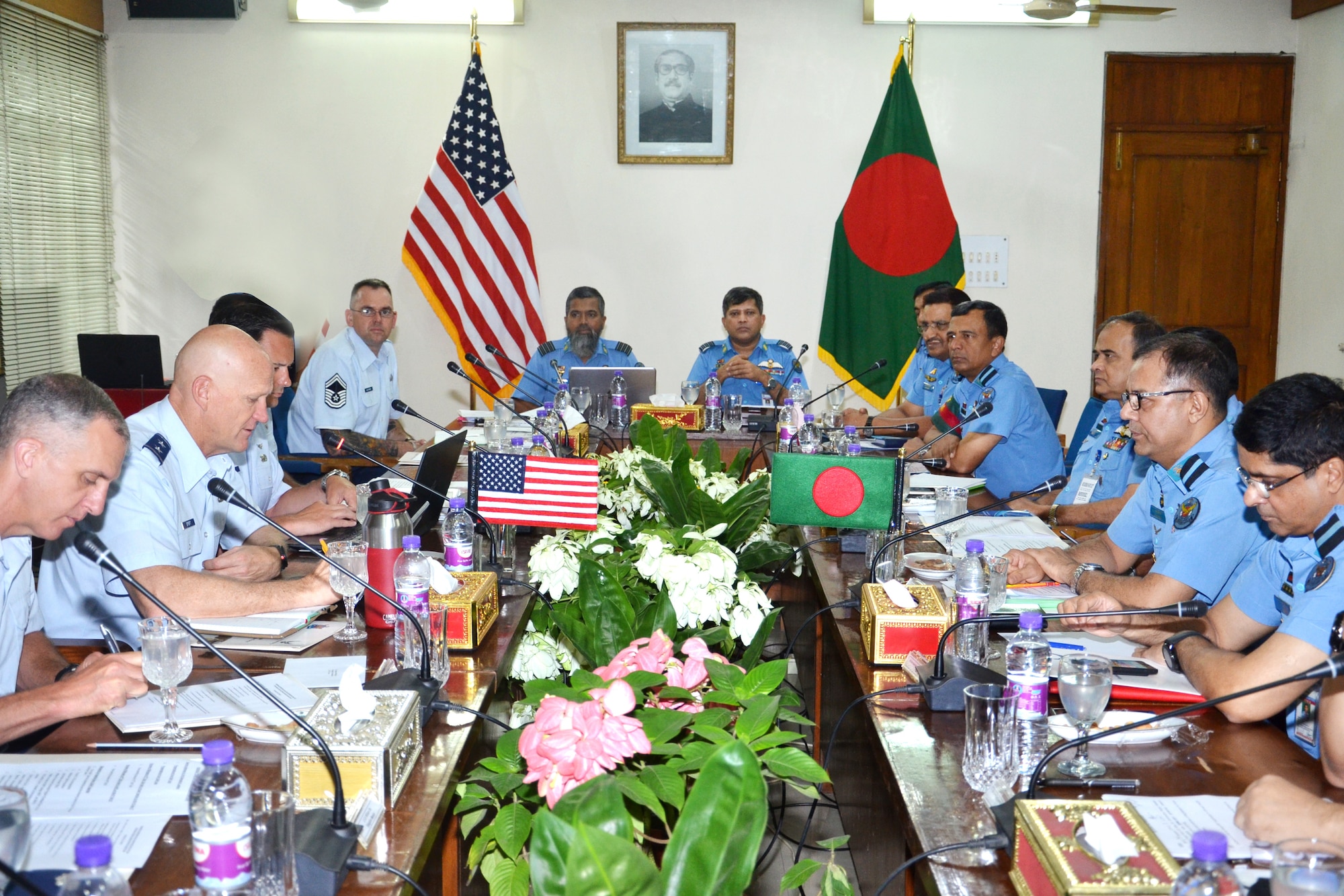 (Left, center) U.S. Air Force Maj. Gen. James Eifert, Air National Guard Assistant to the Commander, Pacific Air Forces, speaks with (right, center) Bangladesh air force Air Commodore M Sayed Hossain, director of air training for the Bangladesh air force, during Airman-to-Airman (A2A) talks held at Air Headquarters of the Bangladesh air force, Dhaka, Bangladesh, Aug. 1-2, 2018. A2A talks are designed to foster military-to-military relationships and pave the way for future collaboration. The exchange allows airmen to meet face-to-face to discuss common regional challenges.