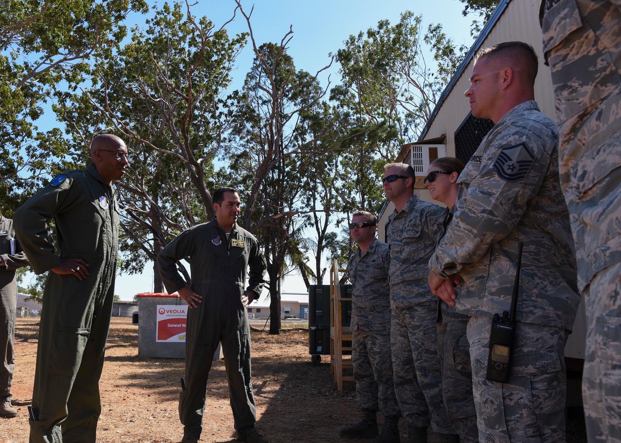 U.S. Air Force Gen. CQ Brown, Jr. (left), Pacific Air Forces commander, and Lt. Col. Joseph Miranda, 80th Fighter Squadron commander, visit with 8th Fighter Wing Airmen from Kunsan Air Base, Republic of Korea, participating in Exercise Pitch Black 2018 at Royal Australian Air Force Base Darwin, Australia, Aug. 13, 2018. Brown visited the exercise to observe first-hand the U.S. involvement in the region and witness the integration with the 15 other participating nations from across the world. (U.S. Air Force photo by Senior Airman Savannah L. Waters)