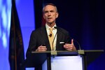 Andrew Hallman, deputy director of CIA for digital innovation, talks about optimizing the intelligence community, as well as developing and maturing digital platforms during the 2018 DoDIIS Worldwide Conference, Aug. 14, 2018, in Omaha, Nebraska.