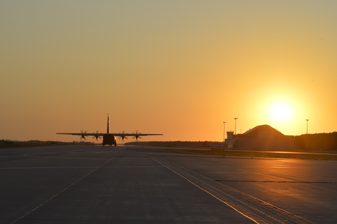 A U.S. Air Force C-130J Super Hercules aircraft assigned to the 86th Airlift Wing taxis toward the runway on Powidz Air Base, Poland, Aug. 3, 2018. For approximately two weeks, U.S. and Polish troops conducted bilateral aerospace exercises during Aviation Rotation 18-4. (U.S. Air Force photo by Senior Airman Joshua Magbanua)