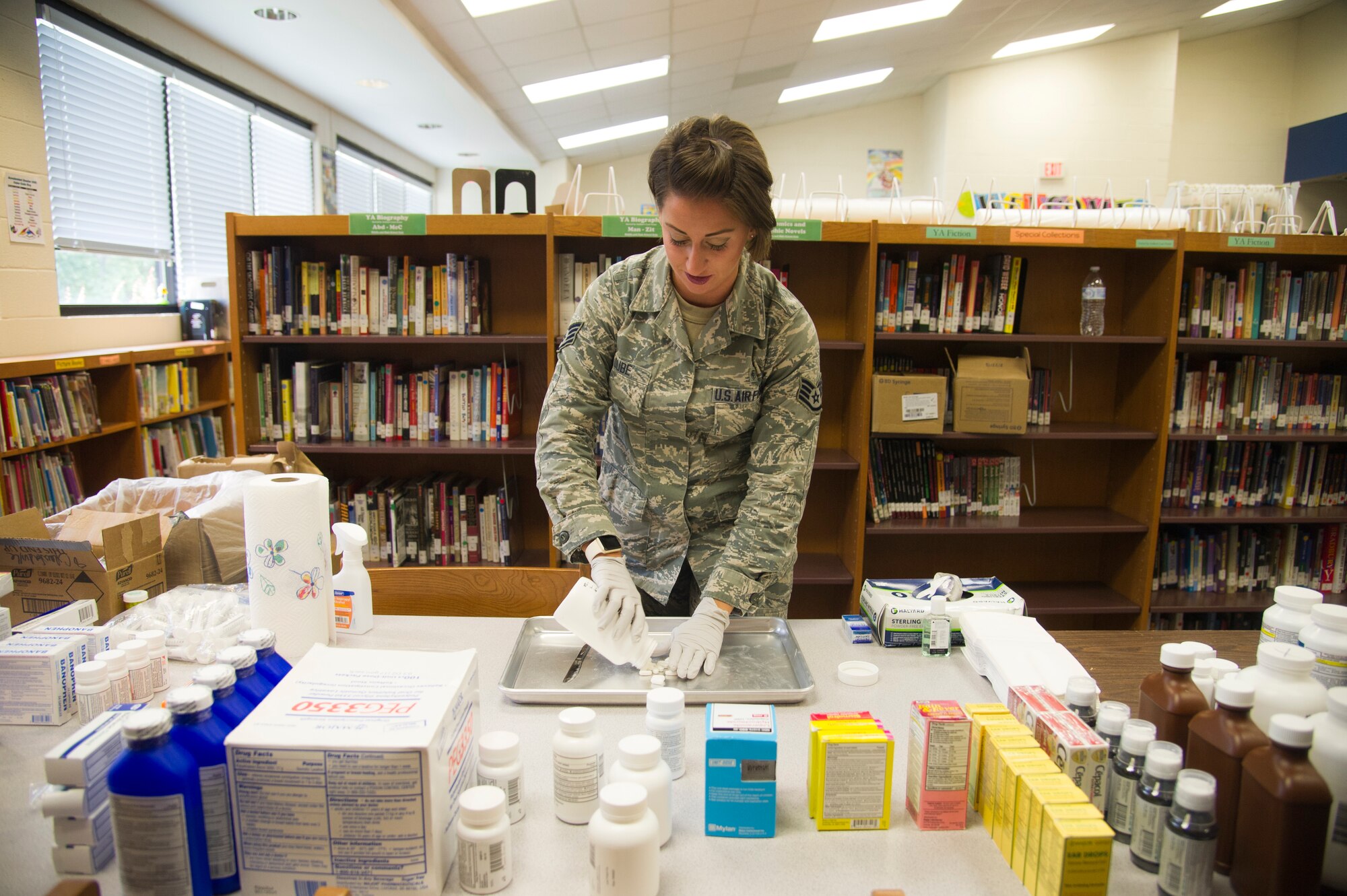 U.S. Air Force Staff Sgt. Jessica Dube, of Martinsburg, W. Va., a pharmacy technician with the West Virginia Air National Guard’s 167th Medical Group, prepares medication for distribution during the East Central Georgia Innovative Readiness Training in Crawfordville, Ga., July 13, 2018. An IRT provides hands-on, real-world training to improve readiness and interoperability for service members in complex contingency environments while providing key services for American communities. (U.S. Air Force photo by Master Sgt. Theanne Herrmann)
