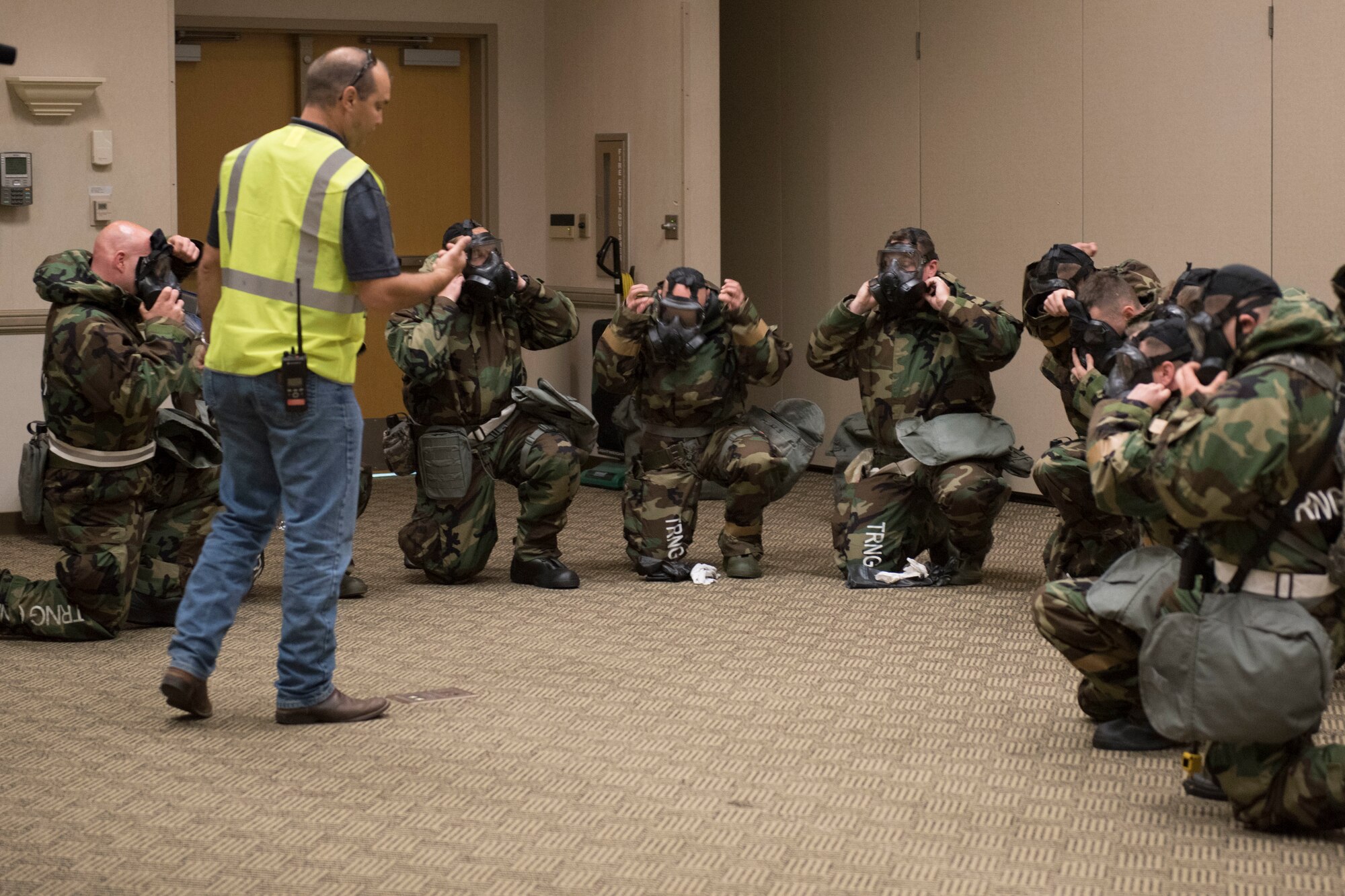 Airmen assigned to the 167th Airlift Wing raced against the clock to don their gas masks during a deployment training exercise at the Alpena Combat Readiness Training Center in Michigan, June 10-14, 2018. Approximately 200 members of the 167th Airlift Wing participated in the event. (U.S. Air National Guard photo by Tech. Sgt. Jodie Witmer)