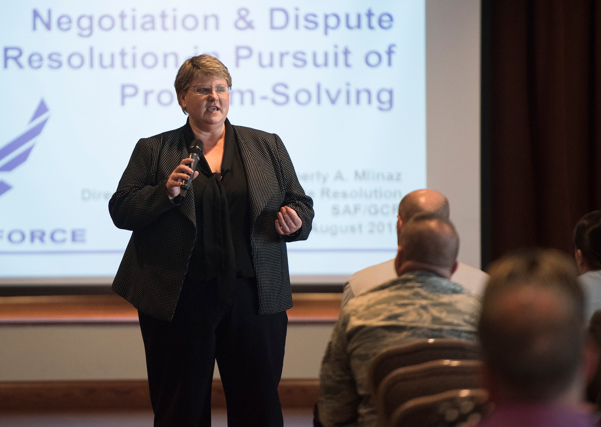 Kimberly Mlinaz, Air Force Alternative Dispute Resolution Program director, teaches the course Negotiation & Dispute Resolution in Pursuit of Problem-Solving to Air Force supervisors in the Wright-Patterson Air Force Base, Ohio, club Aug. 7, 2018. The course taught the risk of litigation to an organization and the value of utilizing the Alternative Dispute Resolution Program in disputes. (U.S. Air Force photo by R.J. Oriez)