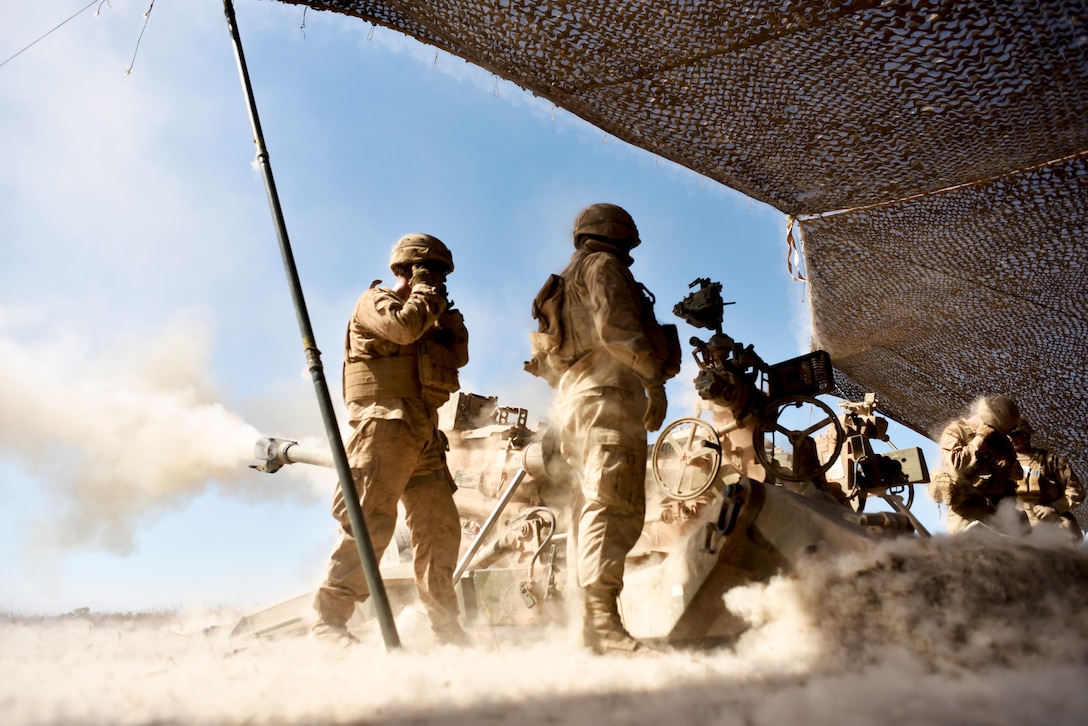 U.S. Marines with Mike Battery, 3rd Battalion, 11th Marine Regiment, 1st Marine Division, fire an M777 Howitzer at known targets during training Aug. 9, 2018, at Mount Bundey Training Area, Northern Territory, Australia.