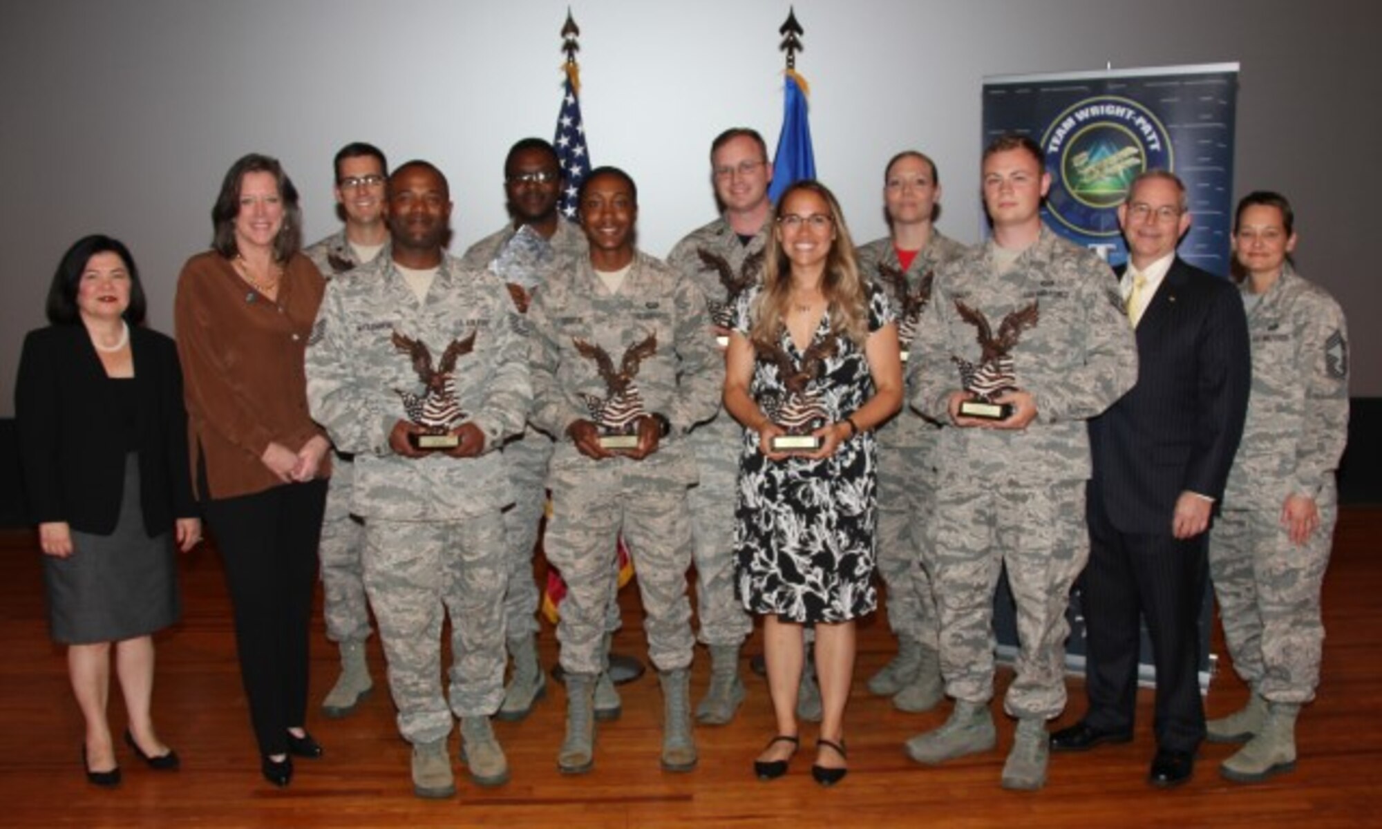 88th Air Base Wing vice director Janet Wirth (left) and 88th Mission Support Group superintendent Chief Master Sergeant Rhonda Walls (right) recognized the 88th Air Base Wing’s 2nd quarter award winners during a ceremony at the base theater, Wright-Patterson Air Force Base, Ohio, August 10, 2018. (U.S. Air Force Photo/Thomas Lewis)