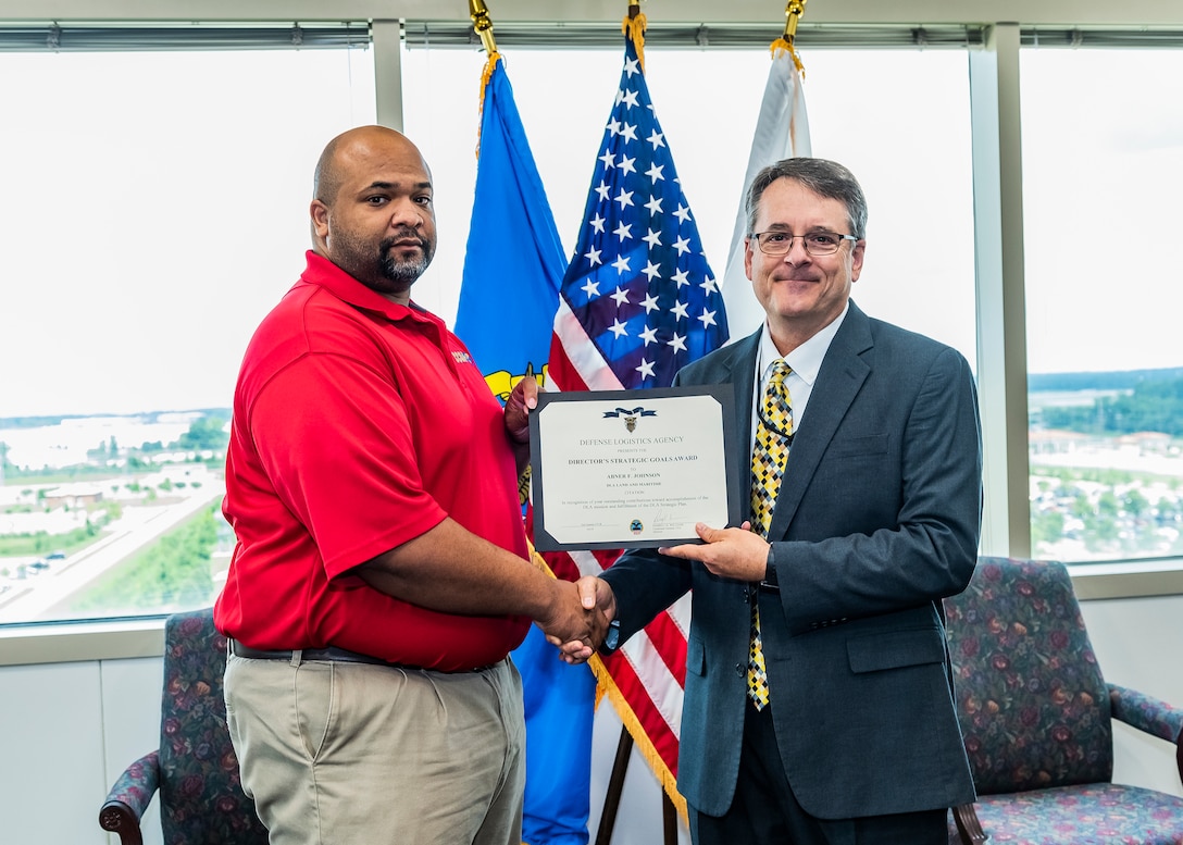 Abner Johnson receives award