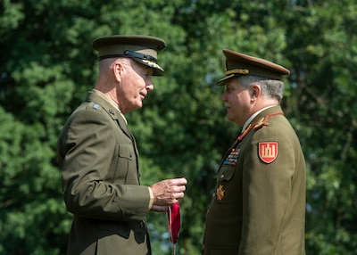 Marine Corps Gen. Joe Dunford, the chairman of the Joint Chiefs of Staff, hosts his Lithuanian counterpart Lt. Gen. Jonas Vytautas Žukas at an honors ceremony on Whipple Field at Fort Myer, Va., Aug. 15, 2018. During the ceremony Dunfored presented Žukas with a Legion of Merit award for service to his country. DoD photo by Navy Petty Officer 1st Class Dominique A. Pineiro