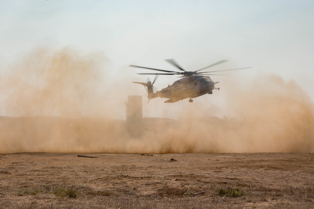 EOTG Marines fast-rope from "Warhorse" Super Stallion