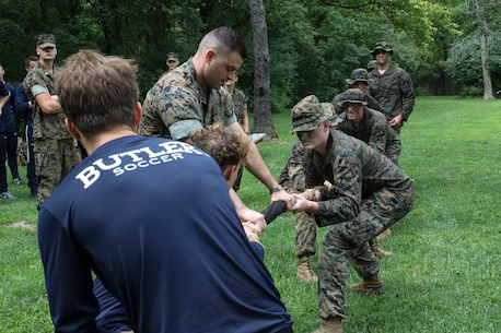INDIANAPOLIS - Marine Corps Officer Candidates School candidates and Butler University men’s soccer team participate in a leadership and cohesion exercise August 15, 2018, at the Fort Harrison State park in Indianapolis. The training allowed the students from the university to experience physical training the Marine Corps way and allowed the Marines to share their leadership style. The exercise also allowed the teams to build cohesion amongst each another. (U.S. Marine Corps photos by Sgt. Carl King)