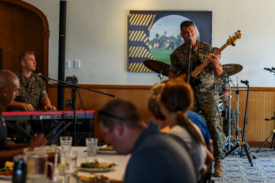 U.S. Marine Corps band members provide an alternative rock performance during lunch as part of Educators’ Workshop at Marine Corps Recruit Depot San Diego August 8, 2018. The workshop is a four-day program designed to better inform high school and college educators about the benefits and opportunities available during service in the Marine Corps. This allows the attendees to return to their place of business and provide firsthand experience and knowledge to individuals interested in military service. (Marine Corps photo by Sgt. Clarence A. Leake)
