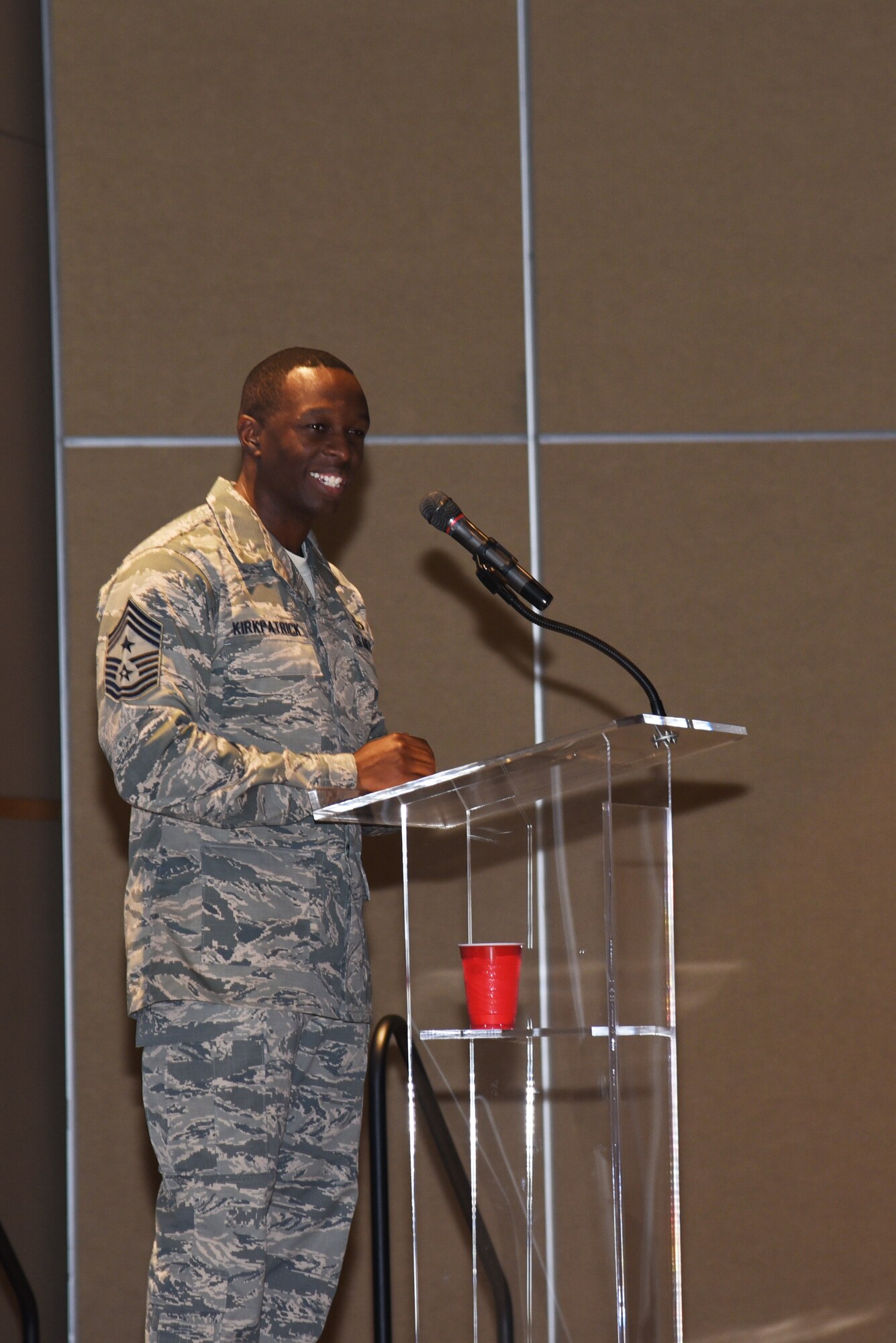 U.S. Air Force Chief Master Sgt. Lavor Kirkpatrick, 17th Training Wing command chief, speaks during a San Angelo Chamber of Commerce luncheon at the McNease Convention Center in San Angelo, Texas, Aug. 14, 2018. During his speech, Kirkpatrick talked about his previous experiences at Goodfellow Air Force Base and how he looks forward to what his future holds here. (U.S. Air Force photo by Staff Sgt. Joshua Edwards/Released)