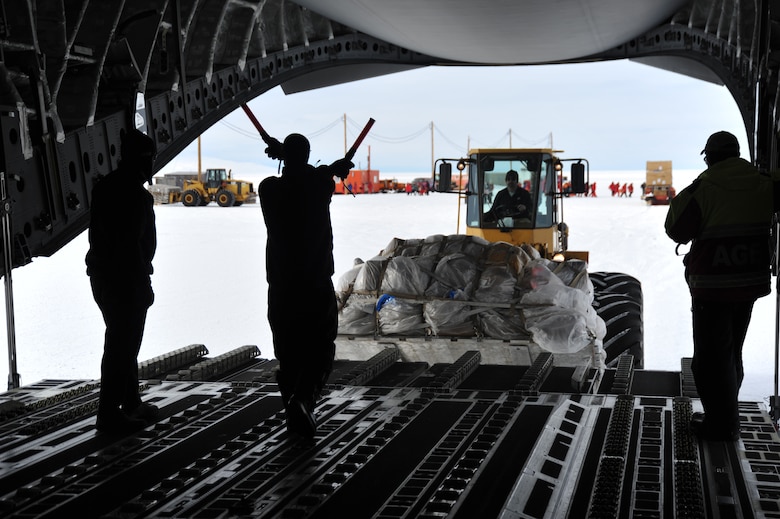 Cargo is loaded onto a C-17 Globemaster III on Feb. 6, 2018, near McMurdo Station in Antarctica. Members of the 304th Expeditionary Airlift Squadron operated aircraft while supporting the U.S. Antarctic Program through Operation Deep Freeze. (Courtesy Photo)