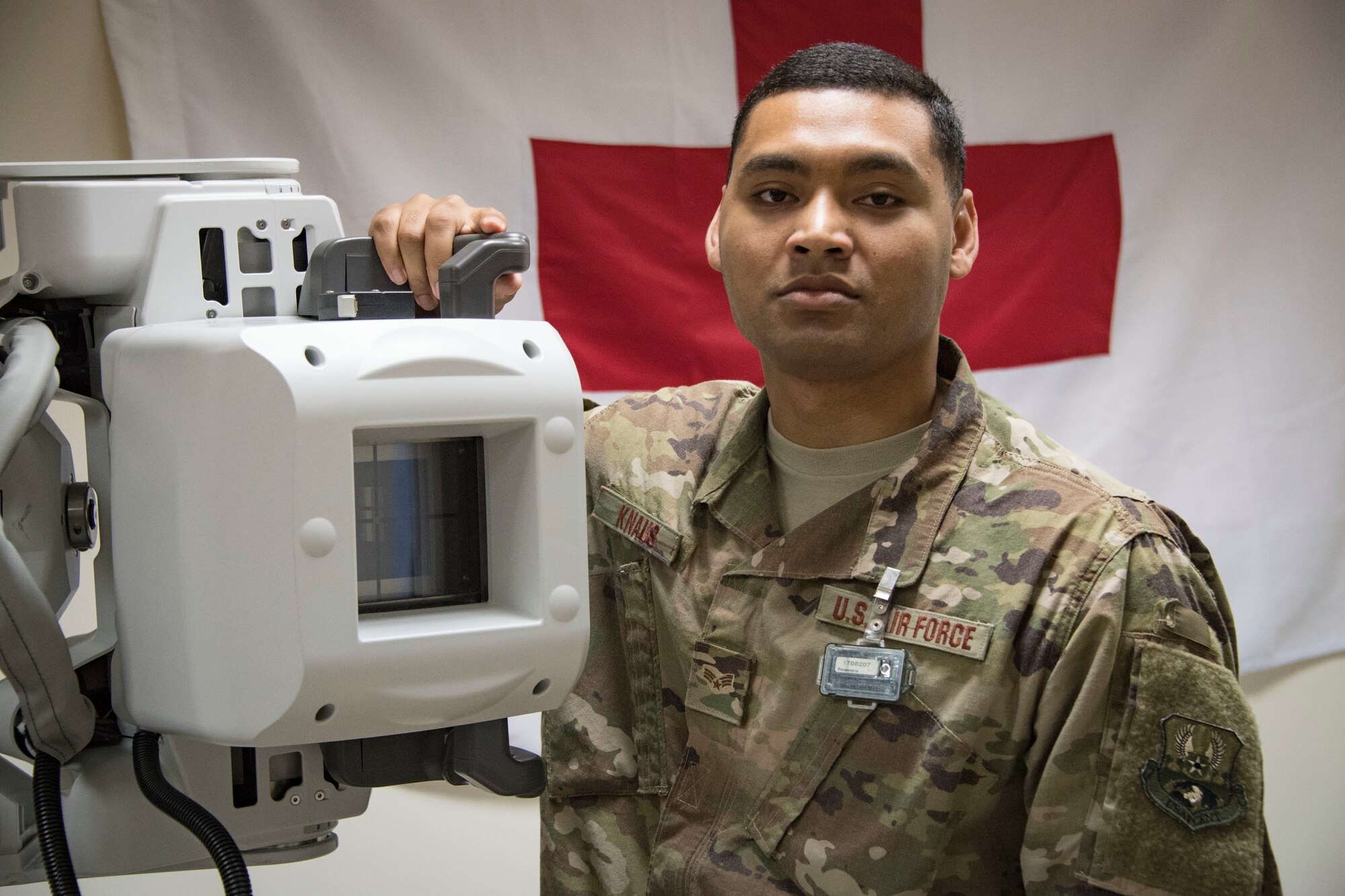 U.S. Air Force Senior Airman Christopher Knaus poses for a photo inside the Medical Groups facility at Al Dhafra Air Base, United Arab Emirates, August 8, 2018. Knaus is assigned to the 380th Expeditionary Medical Group as an X-ray technician. (U.S. photo by Tech. Sgt. Nieko Carzis.)