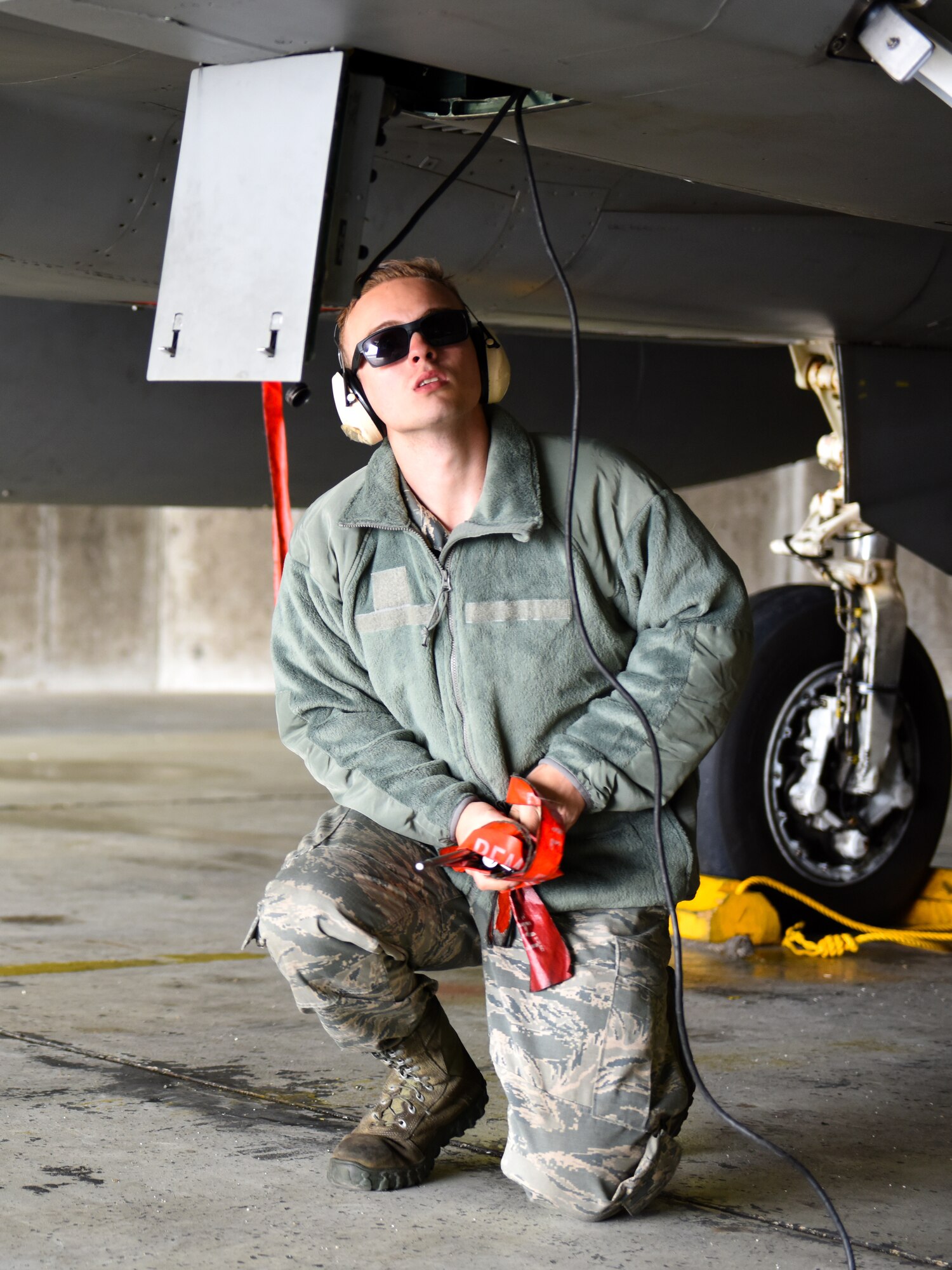 An Airman assigned to the 748th Aircraft Maintenance Squadron prepares an F-15C Eagle for departure at Keflavik Air Base, Iceland, Aug. 1, 2018, in support of NATO’s Icelandic Air Surveillance mission. Deployed from Royal Air Force Lakenheath, England, more than 150 maintainers from the 748th AMXS are facilitating the peacetime preparedness needs and bolstering the security and defense of Iceland. (U.S. Air Force photo/Staff Sgt. Alex Fox Echols III)