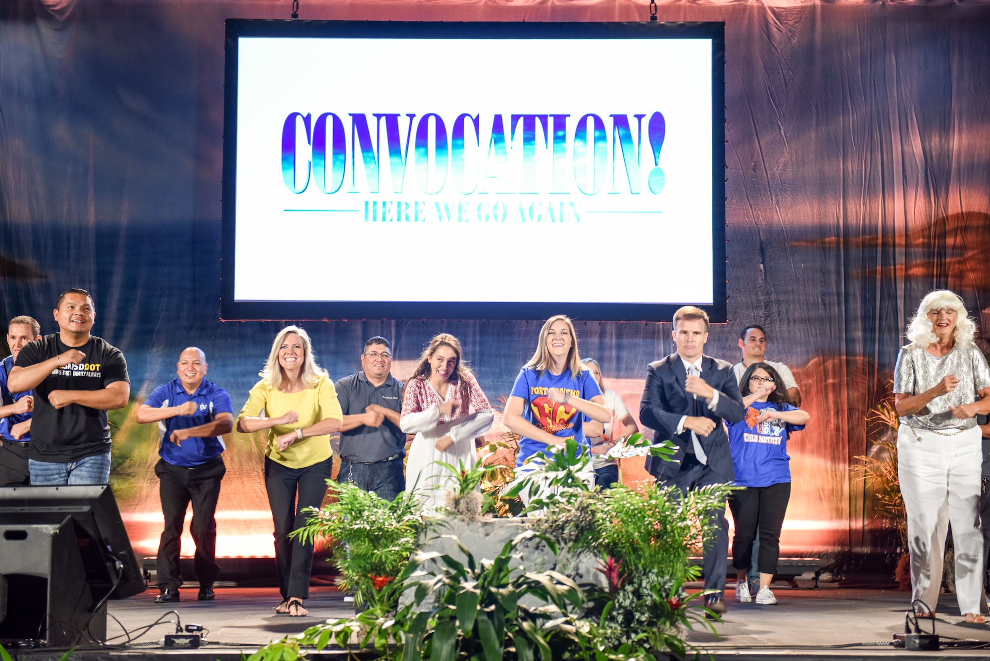 Faculty and staff of the San Angelo Independent School District perform choreography in a "Mama Mia" inspired skit during the SAISD annual convocation at the Foster Communications Coliseum, San Angelo, Texas, Aug. 15, 2018. According to the SAISD website, there are 24 schools within the district with over 14,400 students. (U.S. Air Force photo by Aryn Lockhart/Released)