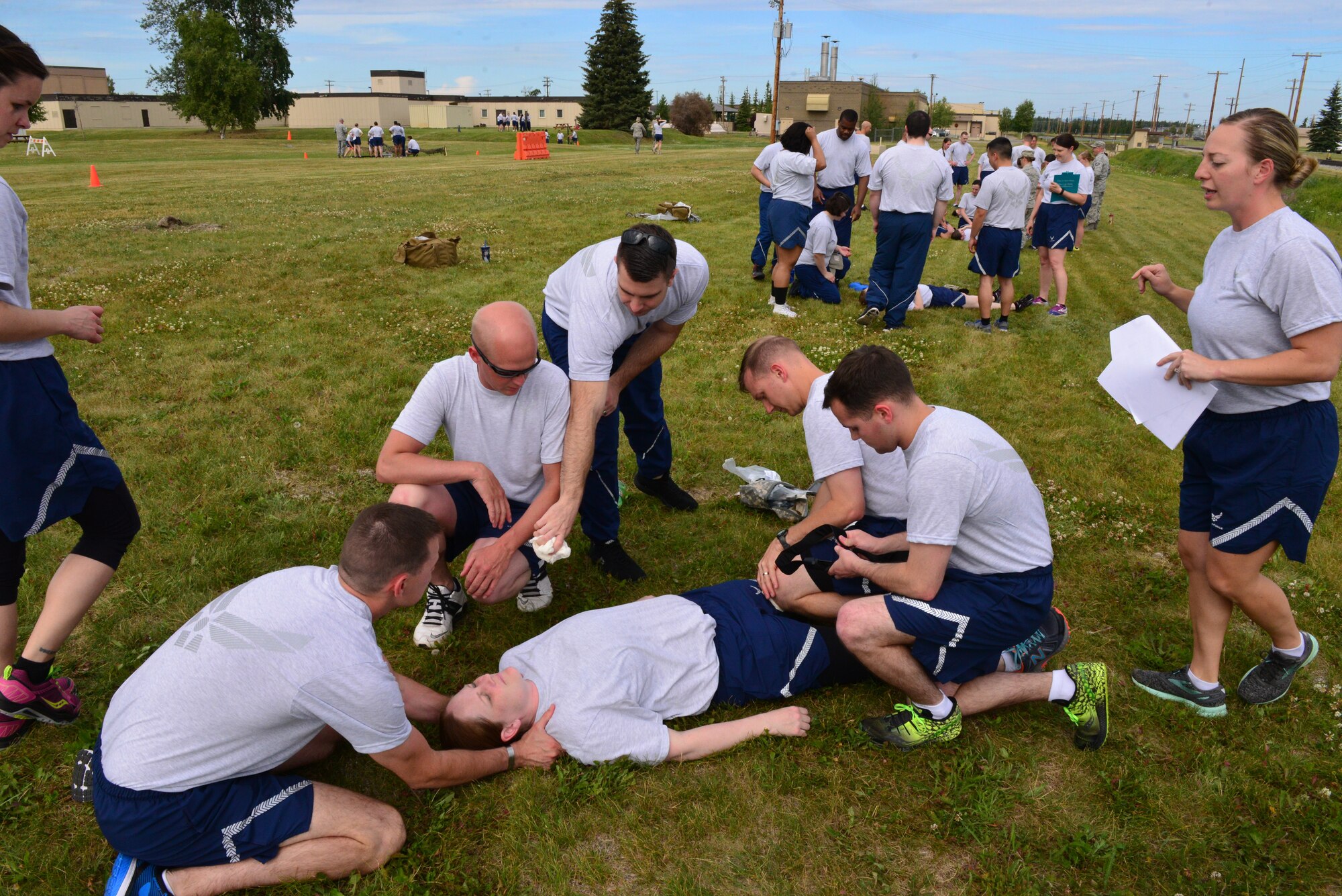 The Icemen of the 354th Medical Group conducted an extensive training exercise encompassing hands-on Self-Aid Buddy Care, litter carries, and patient decontamination, July 25, 2018.